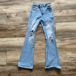 Distressed boot cut jeans
